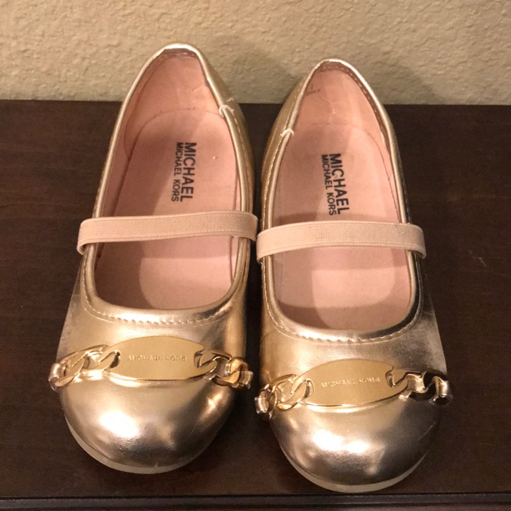 Michael Kors gold flats